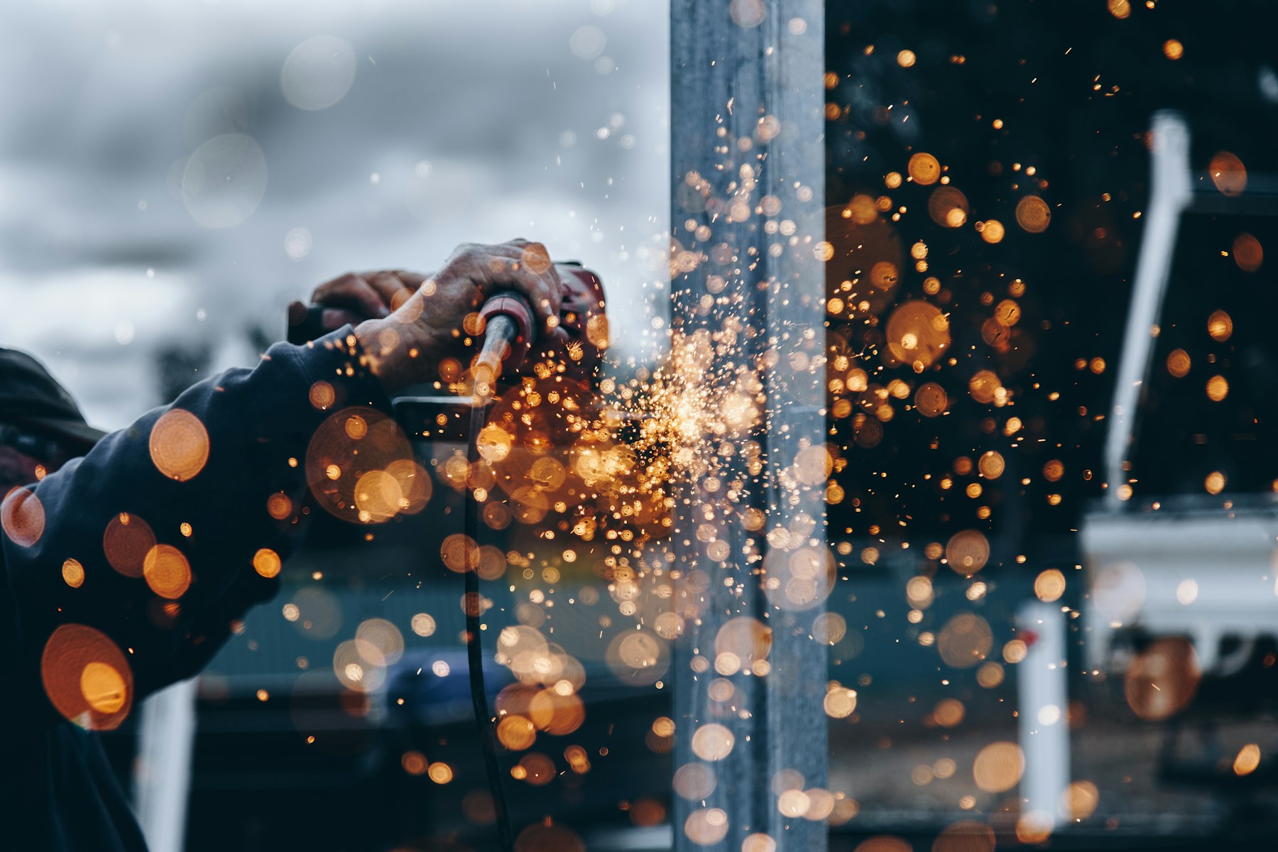 Sparks from an angle grinder in a workshop